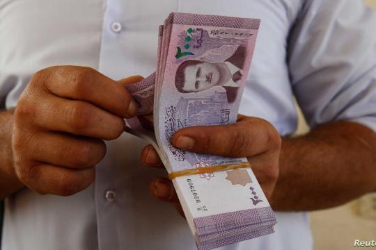 جسور للدراسات": قوانين حكومة النظام الاقتصادية تعيد سورية إلى زمن الخمسينيات