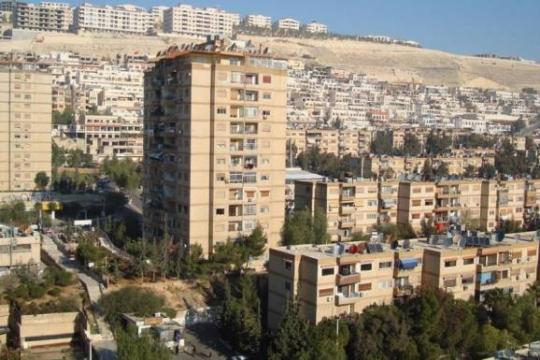 وثائق مسربة تكشف عن خطة إيرانية لشراء عقارات سكنية وبنائها بريف دمشق